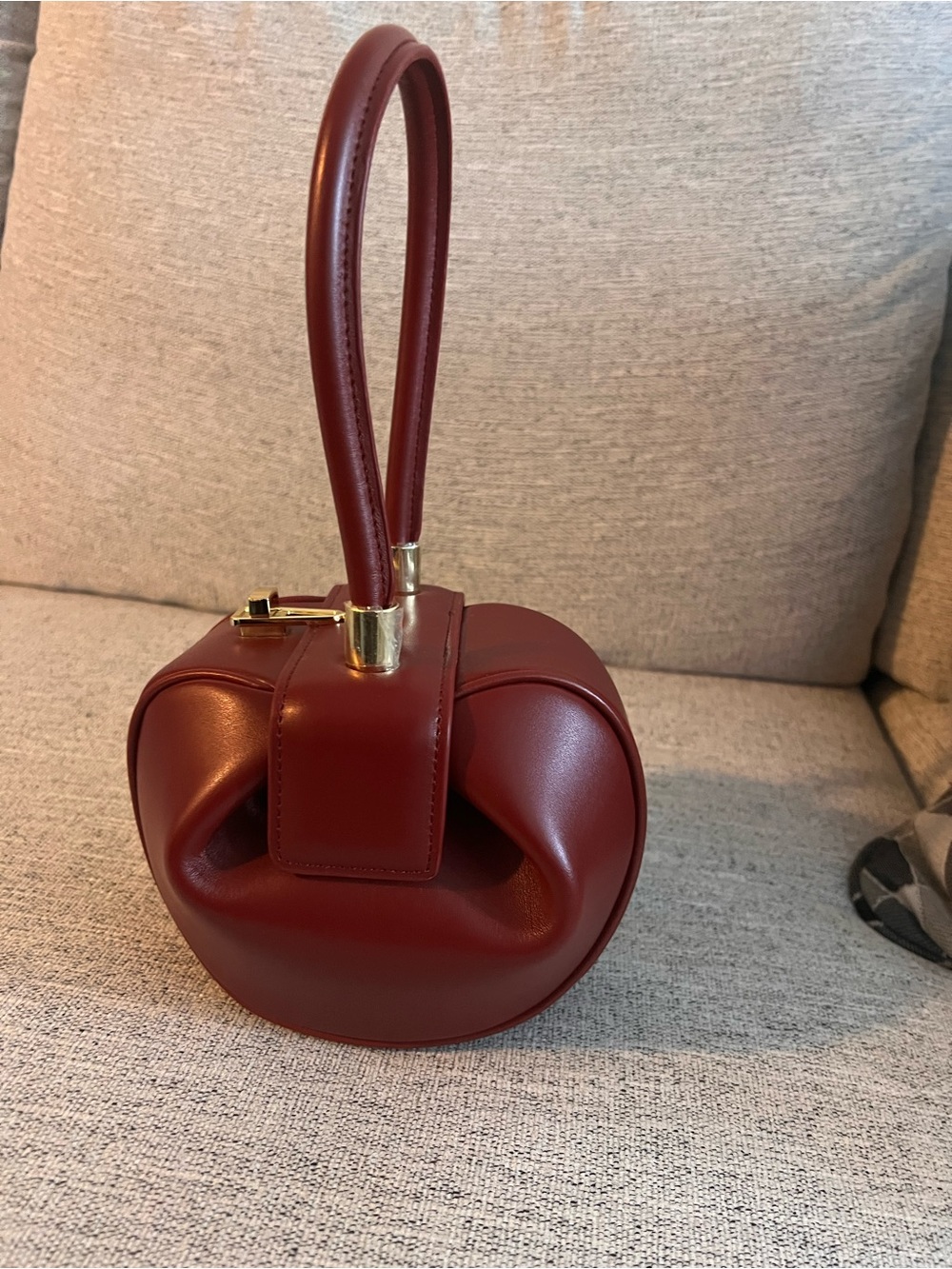 Elegant Women's Round Wristlet Bag in Burgundy